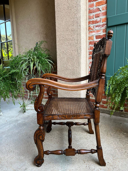 Antique English Arm Chair Carved Oak Cane Seat Renaissance Cherubs Fireside