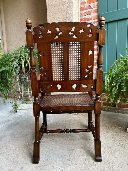 Antique English Arm Chair Carved Oak Cane Seat Renaissance Cherubs Fireside
