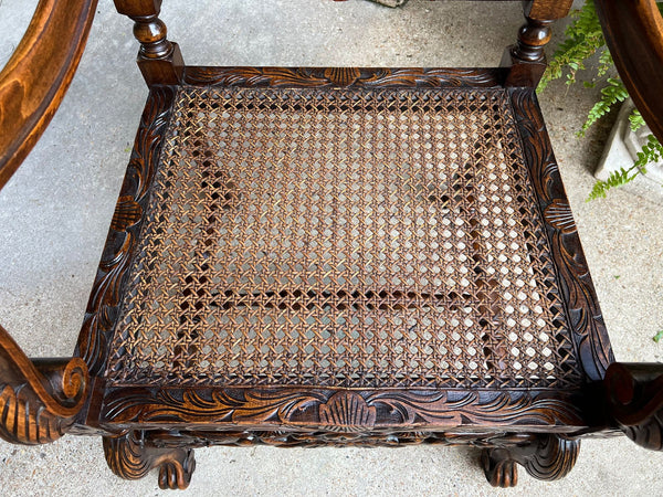 Antique English Arm Chair Carved Oak Cane Seat Renaissance Cherubs Fireside