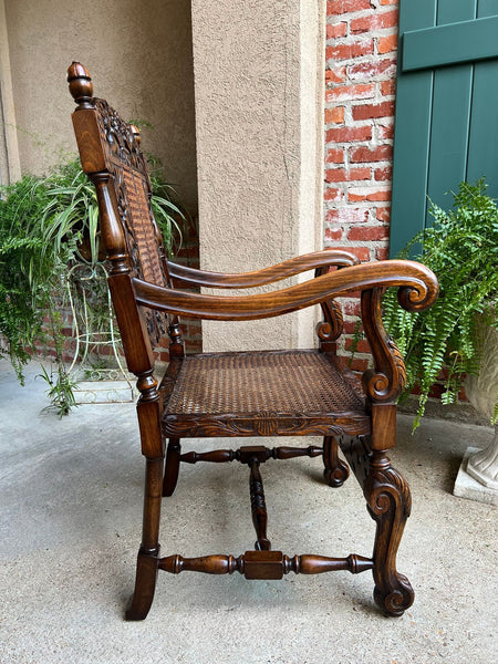 Antique English Arm Chair Carved Oak Cane Seat Renaissance Cherubs Fireside