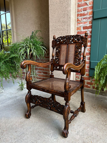 Antique English Arm Chair Carved Oak Cane Seat Renaissance Cherubs Fireside